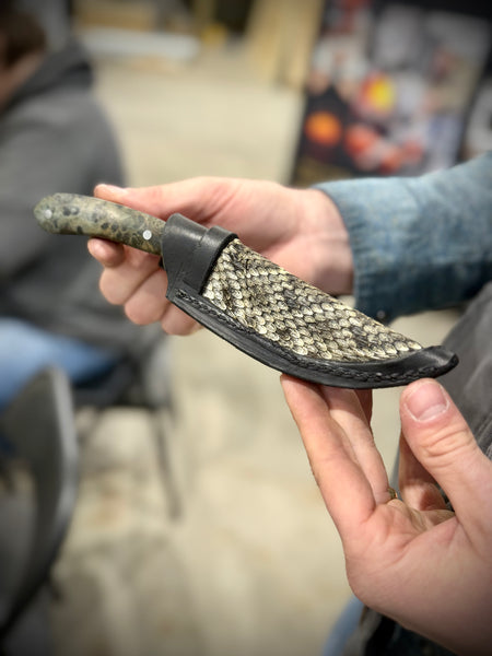 Handcrafted hunter knife being forged during bladesmithing class at Heritage Designs